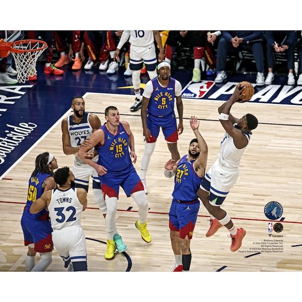 Guard jumping for a rebound in a small-ball lineup during a professional basketball game