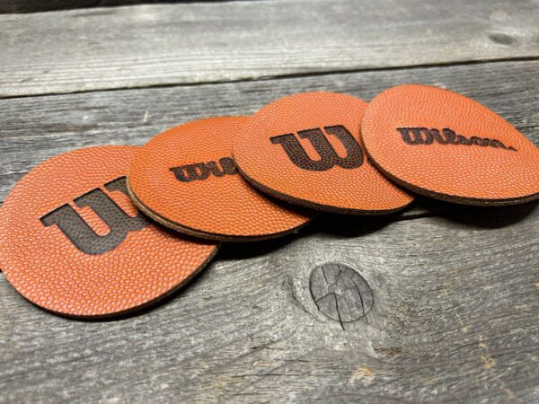 Visual comparison of rubber, composite, and genuine leather basketball balls