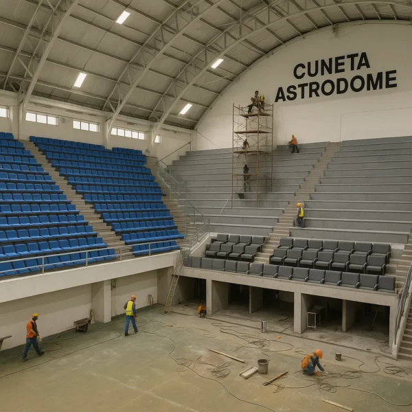 Workers upgrading bleachers and VIP seating during Phase 1 renovations inside Cuneta Astrodome